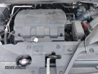 2014 Honda Odyssey Touring with VIN 5FNRL5H97EB054158, listed as a IAAI auction lot 42548360 with 91,161 mi miles and . Bid and sale history available at DreamBid. Image 10.