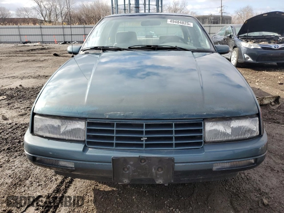 1995 Chevrolet Corsica with VIN 1G1LD55MXSY262499, listed as a Copart auction lot 49484825 with 124,419 mi miles and Salvage Title. Bid and sale history available at DreamBid. Image 5.
