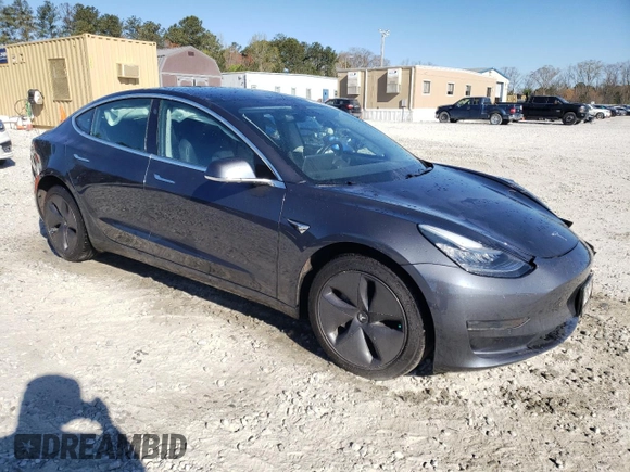 2019 Tesla Model 3 Mid Range with VIN 5YJ3E1EA1KF435295, listed as a Copart auction lot 49552685 with 56,366 mi miles and Salvage Title. Bid and sale history available at DreamBid. Image 4.