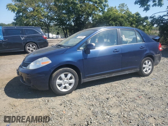 2007 Nissan Versa 1.8 SL with VIN 3N1BC11E27L432802, listed as a Copart auction lot 71018594 with 118,795 mi miles and Salvage Title. Bid and sale history available at carsss.com. Image 1.