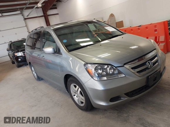 2007 Honda Odyssey EX-L with VIN 5FNRL38737B095747, listed as a IAAI auction lot 42126000 with 178,779 mi miles. Bid and sale history available at carsss.com. Image 1.