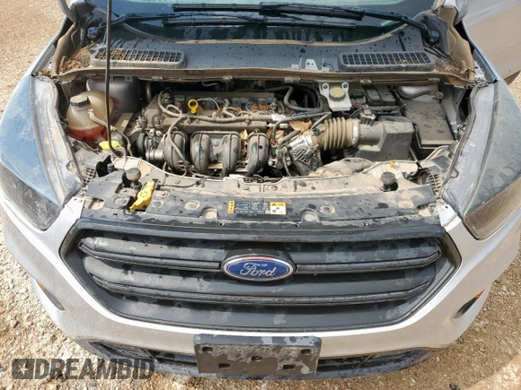2018 Ford Escape S z VIN 1FMCU0F73JUD50086, wystawiony jako Copart lot #65004825 z przebiegiem Nie podano mil oraz Szkoda całkowita • Salvage title. Historia ofert i sprzedaży dostępna na DreamBid. Obrazek 12.