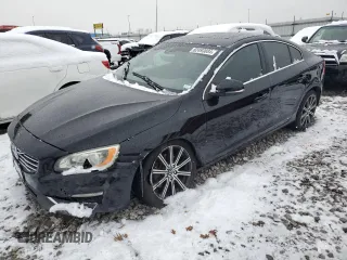 2015 Volvo S60 T6 Drive-E with VIN YV149MFK5F2339707, listed as a Copart auction lot 82493884 with 87,932 mi miles and Salvage Title. Bid and sale history available at carsss.com. Image 1.