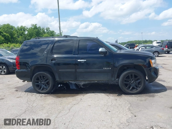 2013 Chevrolet Tahoe LT with VIN 1GNSCBE00DR337071, listed as a IAAI auction lot 42282457 with 151,460 mi miles and . Bid and sale history available at DreamBid. Image 13.
