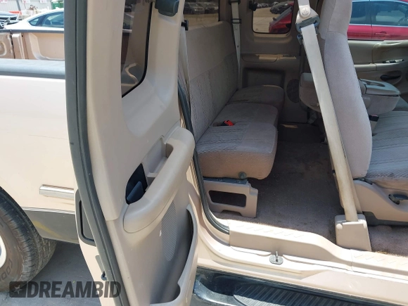 1997 Ford F-150 with VIN 1FTDX1769VNB04591, listed as a IAAI auction lot 42318471 with 202,860 mi miles and . Bid and sale history available at DreamBid. Image 8.