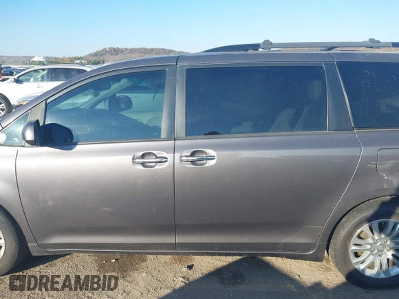 2016 Toyota Sienna XLE with VIN 5TDYK3DC6GS710062, listed as a IAAI auction lot 40953646 with 145,233 mi miles. Bid and sale history available at carsss.com. Image 13.