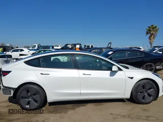 2023 Tesla Model 3 z VIN 5YJ3E1EA5PF401237, wystawiony jako IAAI lot #42520423 z przebiegiem 45 262 mil mil oraz . Historia ofert i sprzedaży dostępna na DreamBid. Obrazek 14.