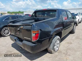 2006 Honda Ridgeline RTL z VIN 2HJYK16596H573159, wystawiony jako IAAI lot #42210214 z przebiegiem 318 126 mil mil oraz . Historia ofert i sprzedaży dostępna na DreamBid. Obrazek 4.