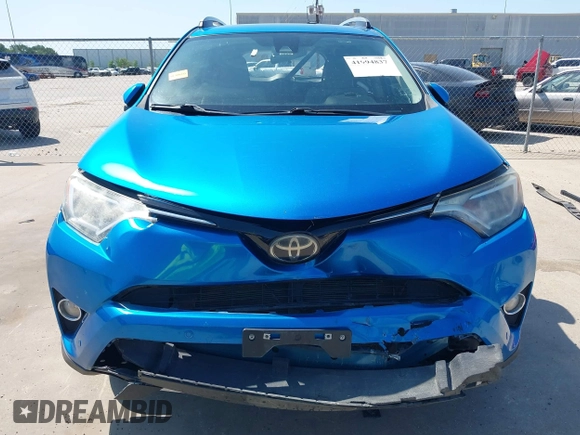 2018 Toyota RAV4 XLE with VIN JTMWFREV2JJ168557, listed as a IAAI auction lot 41994837 with 107,636 mi miles. Bid and sale history available at carsss.com. Image 12.
