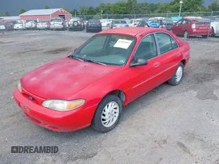 1997 Ford Escort LX with VIN 1FALP13P1VW418844, listed as a IAAI auction lot 42583584 with 145,463 mi miles and . Bid and sale history available at DreamBid. Image 2.