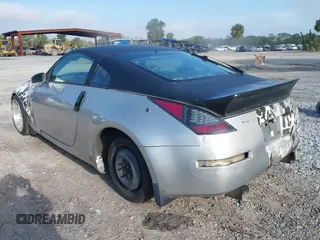 2004 Nissan 350Z Touring with VIN JN1AZ34D44T150578, listed as a IAAI auction lot 41907783 with 198,312 mi miles. Bid and sale history available at carsss.com. Image 3.
