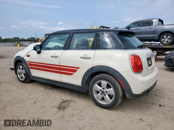 2015 MINI Hardtop 4 Door with VIN WMWXS5C51FT831167, listed as a Copart auction lot 52778685 with 52,770 mi miles and Salvage title. Bid and sale history available at DreamBid. Image 2.