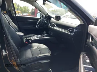 2018 Mazda CX-5 Grand Touring z VIN JM3KFBDM5J0307785, wystawiony jako IAAI lot #42302609 z przebiegiem 81 974 mil mil oraz . Historia ofert i sprzedaży dostępna na DreamBid. Obrazek 5.