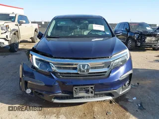 2021 Honda Pilot EX-L with VIN 5FNYF6H5XMB019411, listed as a IAAI auction lot 41756016 with 55,558 mi miles. Bid and sale history available at carsss.com. Image 12.