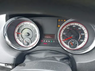 2014 Dodge Grand Caravan SXT with VIN 2C4RDGCG4ER120877, listed as a IAAI auction lot 42142083 with 199,895 mi miles and . Bid and sale history available at DreamBid. Image 7.