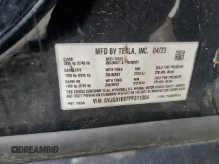 2023 Tesla Model S Plaid with VIN 5YJSA1E67PF511354, listed as a Copart auction lot 56648975 with 69,002 mi miles and Salvage title. Bid and sale history available at DreamBid. Image 13.