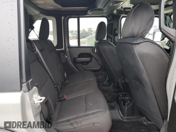2023 Jeep Wrangler Sport Altitude with VIN 1C4HJXDG1PW679641, listed as a Copart auction lot 50371475 with 18,546 mi miles and Salvage Title. Bid and sale history available at DreamBid. Image 10.