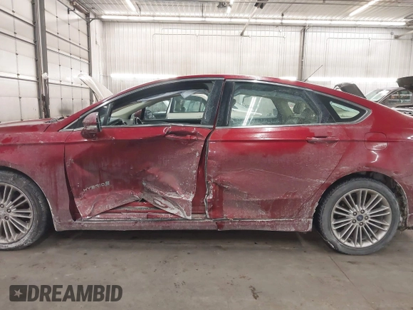2014 Ford Fusion SE Hybrid with VIN 3FA6P0LU5ER136237, listed as a IAAI auction lot 41590088 with 174,009 mi miles. Bid and sale history available at carsss.com. Image 14.