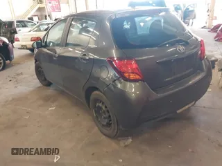 2015 Toyota Yaris L with VIN VNKKTUD36FA049550, listed as a IAAI auction lot 41671226 with 129,540 mi miles. Bid and sale history available at carsss.com. Image 3.