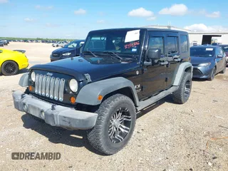 2008 Jeep Wrangler Unlimited X with VIN 1J4GA39148L500904, listed as a IAAI auction lot 42434386 with 195,997 mi miles and . Bid and sale history available at DreamBid. Image 2.