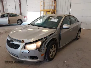 2014 Chevrolet Cruze 1LT with VIN 1G1PC5SB2E7296549, listed as a IAAI auction lot 42797744 with 137,343 mi miles and . Bid and sale history available at DreamBid. Image 6.