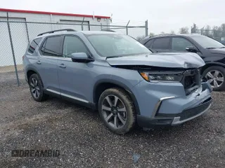 2024 Honda Pilot Elite with VIN 5FNYG1H89RB028392, listed as a IAAI auction lot 42031042 with 18,685 mi miles. Bid and sale history available at carsss.com. Image 1.