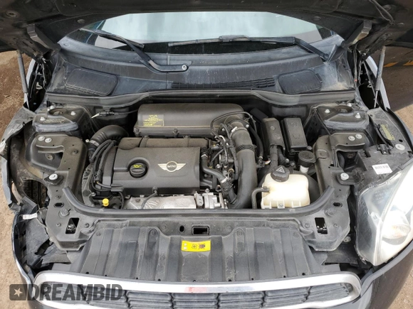2014 MINI Countryman S with VIN WMWZC5C56EWP38065, listed as a Copart auction lot 59518395 with 91,106 mi miles and Salvage title. Bid and sale history available at DreamBid. Image 11.