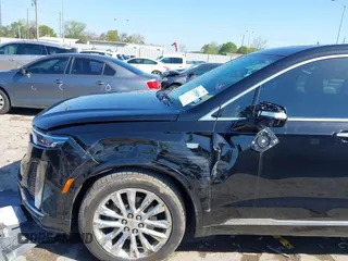 2020 Cadillac XT6 FWD Premium Luxury z VIN 1GYKPERS0LZ232338, wystawiony jako IAAI lot #41845562 z przebiegiem 86 839 mil mil oraz . Historia ofert i sprzedaży dostępna na DreamBid. Obrazek 6.