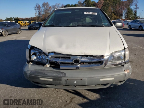 2000 Toyota Sienna LE with VIN 4T3ZF13C5YU201708, listed as a Copart auction lot 83924024 with 219,940 mi miles and Salvage Title. Bid and sale history available at DreamBid. Image 5.