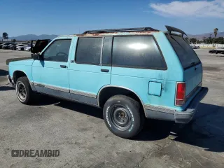 1991 GMC Jimmy z VIN 1GKCS13Z2M2518231, wystawiony jako Copart lot #64115274 z przebiegiem 132 698 mil mil oraz Czysty tytuł • Clean title. Historia ofert i sprzedaży dostępna na DreamBid. Obrazek 2.