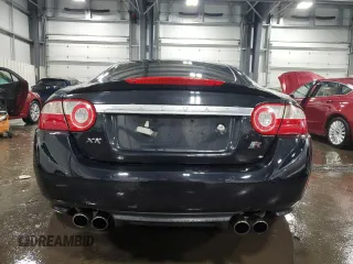 2007 Jaguar XK with VIN SAJWA43C479B18700, listed as a Copart auction lot 83377684 with 143,746 mi miles and Salvage Title. Bid and sale history available at carsss.com. Image 6.