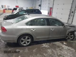 2013 Volkswagen Passat SE w/Sunroof & Nav with VIN 1VWBP7A30DC150018, listed as a IAAI auction lot 41580416 with 75,231 mi miles. Bid and sale history available at carsss.com. Image 14.