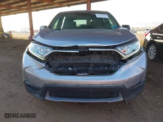 2019 Honda CR-V LX with VIN 2HKRW5H34KH420447, listed as a IAAI auction lot 41616151 with 104,373 mi miles. Bid and sale history available at carsss.com. Image 6.
