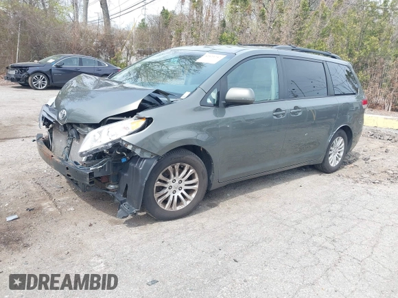 2012 Toyota Sienna XLE AAS with VIN 5TDYK3DC1CS199113, listed as a IAAI auction lot 42123757 with 211,723 mi miles and . Bid and sale history available at carsss.com. Image 18.