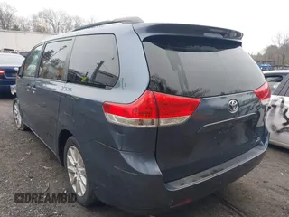 2013 Toyota Sienna LE with VIN 5TDJK3DC8DS064035, listed as a IAAI auction lot 41909785 with 135,716 mi miles and . Bid and sale history available at DreamBid. Image 3.