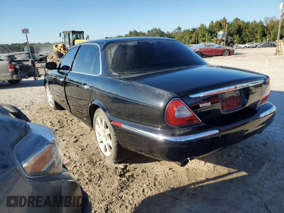 2005 Jaguar XJ Vanden Plas z VIN SAJWA82C05SG47513, wystawiony jako Copart lot #75428654 z przebiegiem 157 442 mil mil oraz Szkoda całkowita • Salvage title. Historia ofert i sprzedaży dostępna na DreamBid. Obrazek 2.