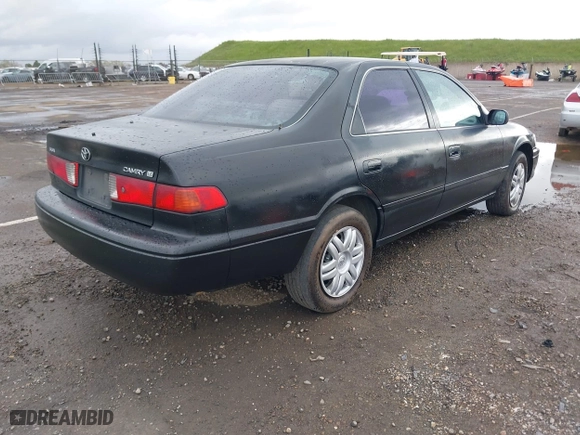 2000 Toyota Camry CE with VIN JT2BG22KXY0432288, listed as a IAAI auction lot 41927856 with 203,035 mi miles. Bid and sale history available at carsss.com. Image 4.