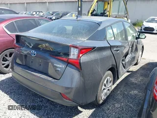 2022 Toyota Prius L Eco with VIN JTDKAMFU7N3154041, listed as a IAAI auction lot 41896210 with 46,382 mi miles and . Bid and sale history available at DreamBid. Image 4.