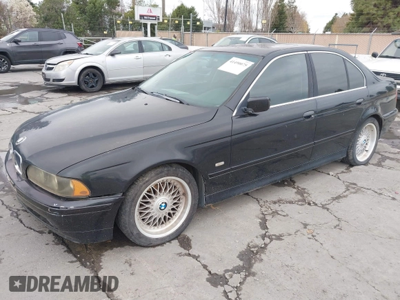 2001 BMW 5 Series 525iA with VIN WBADT43451GX20026, listed as a IAAI auction lot 41490075 with 141,700 mi miles. Bid and sale history available at carsss.com. Image 2.