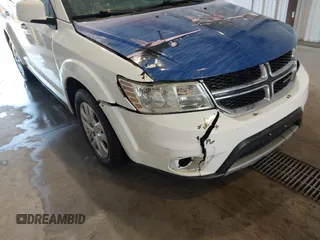 2019 Dodge Journey SE with VIN 3C4PDCBBXKT835029, listed as a IAAI auction lot 42120482 with 130,282 mi miles and . Bid and sale history available at DreamBid. Image 6.