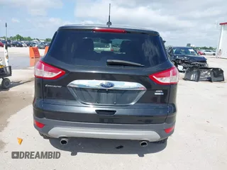 2013 Ford Escape SEL with VIN 1FMCU9HX1DUB97939, listed as a IAAI auction lot 42293561 with 196,951 mi miles and . Bid and sale history available at DreamBid. Image 17.