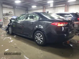 2021 Toyota Corolla Hybrid LE with VIN JTDEAMDE1MJ000461, listed as a Copart auction lot 45536215 with 29,891 mi miles and Salvage Title. Bid and sale history available at carsss.com. Image 2.