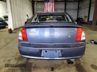 2003 Kia Spectra GS z VIN KNAFB161135104592, wystawiony jako Copart lot #52097205 z przebiegiem 119 206 mil mil oraz Szkoda całkowita • Salvage title. Historia ofert i sprzedaży dostępna na DreamBid. Obrazek 6.