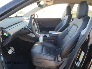 2022 Tesla Model Y Performance z VIN 7SAYGDEF3NF446769, wystawiony jako Copart lot #83702074 z przebiegiem 32 895 mil mil oraz Szkoda całkowita • Salvage title. Historia ofert i sprzedaży dostępna na DreamBid. Obrazek 7.