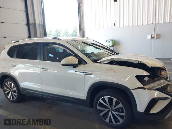 2022 Volkswagen Taos SE z VIN 3VVLX7B20NM064027, wystawiony jako IAAI lot #40429741 z przebiegiem 31 290 mil mil oraz . Historia ofert i sprzedaży dostępna na DreamBid. Obrazek 14.