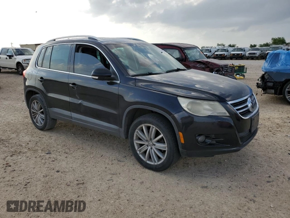 2011 Volkswagen Tiguan SEL with VIN WVGAV7AX3BW524720, listed as a Copart auction lot 55171275 with 142,912 mi miles and Clean title. Bid and sale history available at DreamBid. Image 4.