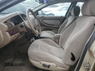 2001 Chrysler Sebring with VIN 1C3EL46U21N529263, listed as a Copart auction lot 82156584 with 57,895 mi miles and Clean Title. Bid and sale history available at DreamBid. Image 7.