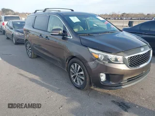 2016 Kia Sedona EX with VIN KNDMC5C1XG6159271, listed as a IAAI auction lot 41409277 with 95,696 mi miles. Bid and sale history available at carsss.com. Image 1.