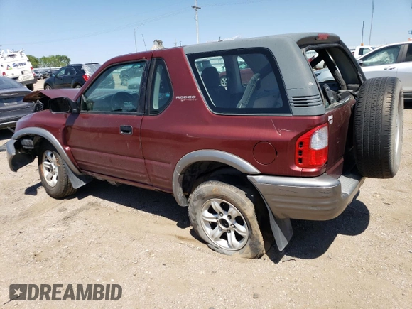 2002 Isuzu Rodeo z VIN 4S2CK57W324328446, wystawiony jako Copart lot #58097174 z przebiegiem 118 514 mil mil oraz Szkoda całkowita • Salvage title. Historia ofert i sprzedaży dostępna na DreamBid. Obrazek 2.