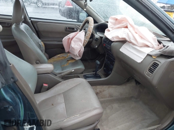 1996 Acura Integra LS with VIN JH4DB7657TS007946, listed as a IAAI auction lot 41524115 with 247,409 mi miles and . Bid and sale history available at DreamBid. Image 5.
